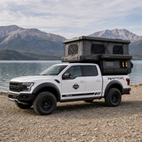 Camping-car rigide pour pick-up, type slide-in, avec cuisine et douche, pour 4x4 et voyages tout-terrain.