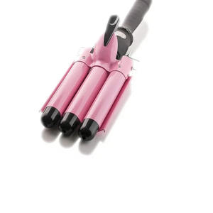 Fer à boucler triple barillet Myrva 1,25 pouces en céramique chauffant pour salon, convient à tous les types de cheveux - Product Image 5