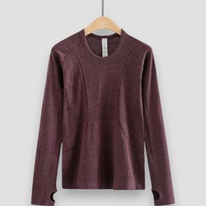 Haut de yoga à manches longues de couleur unie OEM pour femmes, t-shirt de sport avec trou pour le pouce, col rond, vêtements de sport d'été et d'automne. - Product Image 1