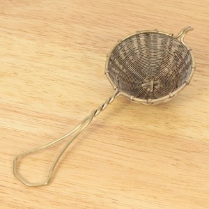 Handcrafted brass tea strainer with woven mesh design for fine <b>filtering</b> elegant serving and traditional kitchen utility use - Product Image 1