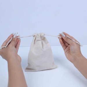 Fabricant de gros sacs à dos en coton éco-conscient avec cordon de serrage tissu 250 GSM solide pour le stockage polyvalent - Product Image 6