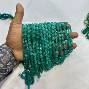 Monalisa ลูกปัดแก้วทรงวงรีสีฟ้าธรรมชาติขนาด7/9มม. พลอยสีเขียวหนึ่งเส้น12นิ้ว - Product Image 4