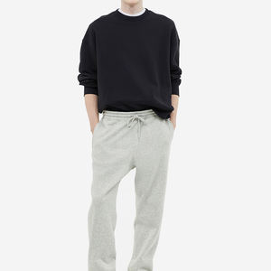 Ropa deportiva personalizada de alta calidad para hombre, pantalones de chándal negros para gimnasio, pantalones de chándal deportivos con estampado de algodón liso ligero - Product Image 1