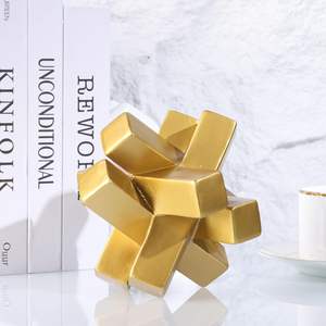 Modern <b>Gold</b> Knot <b>Statue</b> a striking minimalist sculpture designed to bring contemporary elegance to any space - Product Image 5