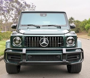 Dernier modèle vert 2024 <span class=keywords><strong>Mercedes</strong></span>-<span class=keywords><strong>AMG</strong></span> <span class=keywords><strong>G</strong></span> 63 d'occasion, intérieur foncé, sièges en cuir, toit ouvrant, camion avec le meilleur <span class=keywords><strong>prix</strong></span>, camion de qualité - Product Image 1