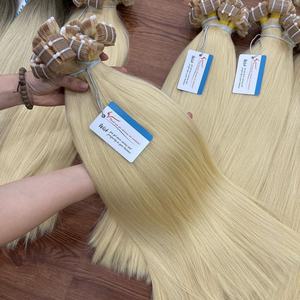 Venta al por mayor 50% Extensiones de cinta de cabello virgen vietnamita de gran orden con máquina Trama doble Todos los colores y longitudes - Product Image 4