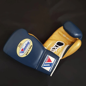 Guantes de combate profesionales ganadores de alta calidad Guantes de boxeo de diseño personalizado hechos de cuero - Product Image 3