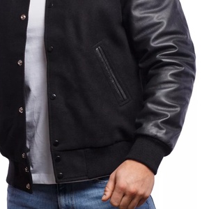 Chaquetas universitarias de béisbol de invierno personalizadas OEM para hombre, estilo informal, bordado, estampado de hojaldre, lona negra, cuello acanalado, Mangas de cuero - Product Image 4