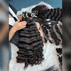 ผมเรมี่แบบมัดรวม32นิ้วคลื่นธรรมชาติดึงสองชั้นจากกัมพูชา - Product Image 1