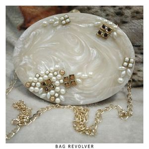 การตกแต่งที่เชื่อมโยงกับคลัทช์เรซินคุณภาพมาตรฐานกระเป๋าดีไซน์เนอร์ที่ไม่ซ้ำใครหรูหราเป็นมิตรกับสิ่งแวดล้อมงานแฮนด์เมดราคาที่ดีที่สุดดีไซน์ตกแต่ง - Product Image 3