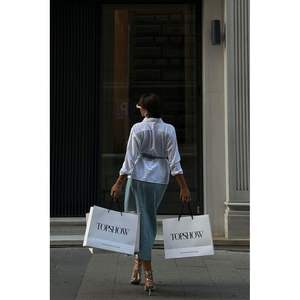 Jupe en jean TOPSHOW pour femme, motif sequins bleus - Options de vente en gros disponibles - Product Image 1