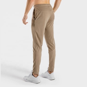 Joggers de alta calidad para hombre, pantalones de chándal informales para gimnasio personalizados, pantalones de chándal ajustados de algodón y poliéster con bolsillos con cremallera - Product Image 2