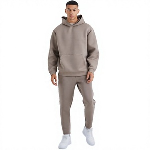 Fabricante de Conjuntos de Sudadera con Capucha y Pantalones Deportivos Holgados de Algodón Grueso para Hombre con Logotipo Personalizado OEM - Product Image 1