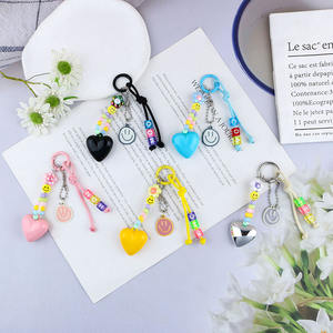Mini mignon perlé porte-clés gland frais créatif sourire visage pendentif pour dames amour sac pendentif breloques étui Mobile porte-clés - Product Image 1
