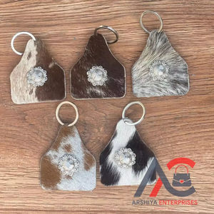 มาใหม่สไตล์ร้อนขายผมบนหนัง Cowhide พวงกุญแจหนังแท้พวงกุญแจรูปทรงที่ไม่ซ้ํากันหนังพวงกุญแจหรูหรา - Product Image 1