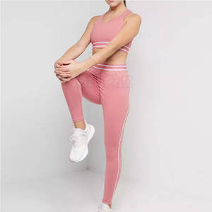 Ensemble de yoga 2 pièces pour femme, couleur unie, respirant, éco-responsable, taille élastique, logo avant, sans couture, haute qualité - Product Image 1