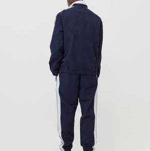 Venta al por mayor de tallas grandes de ajuste regular cuello levantado cortavientos conjunto de tuberías de trabajo DTF impreso poliéster chándales rayas Jogging Wear - Product Image 2