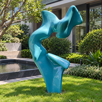 Sculpture abstraite personnalisée en résine de fibre de verre avec finition bleue brillante pour les projets de jardin, de fontaines et de aménagements paysagers résidentiels