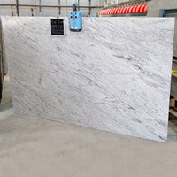 Fournisseur indien moderne propose des carreaux de granit blanc rivière poli sur mesure, avec veinage marbré, découpés sur mesure pour cuisine et salle de bain
