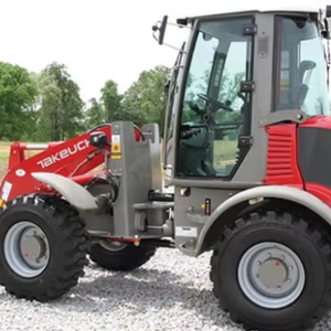Les spécifications du chargeur sur pneus Performance Takeuchi TW60C2HS offrent une fiabilité de premier ordre et une cabine fermée confortable. - Product Image 1