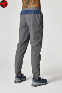 Pantalon de survêtement en nylon personnalisé pour homme, séchage rapide, élasticité, empilé, uni, coupe-vent, léger, style décontracté - Product Image 4