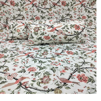 Draps de lit 100% coton sur mesure de différentes tailles dans des motifs floraux dans des couleurs pastel et vives avec des housses d'oreiller.