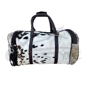 Top Quality Hair on Hide Duffel <b>Bag</b> Large Black White Genuine Cowhide <b>Overnight</b> Weekender Duffel Bulk Manufacturer in Pakistan - Product Image 1