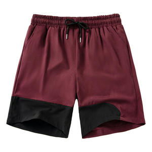 Pantalones cortos para correr holgados deportivos informales unisex para hombre, pantalones cortos con bolsillos, logotipo personalizado, patrón sólido, pantalones cortos de malla para hombre - Product Image 2
