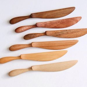 Cuchillo de pastel de madera Cuchillo de pastel de color de madera natural Producto más vendido Cuchillo de mantequilla de madera y uso de corte de pastel Estilo americano - Product Image 1