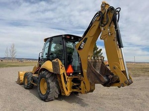 รถตักดิน Caterpillar 424 4WD พร้อมหัวเจาะ แอร์ ระบบเลื่อนด้านข้าง ราคาถูก ขาย - Product Image 2