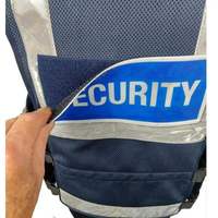 Sécurité personnalisée hommes matériau solide réfléchissant vêtements de sécurité gilet noir sécurité routière gilet tactique