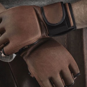 2025 Color sólido Buena calidad Nuevo estilo Producto 4 OZ Guantes MMA para hombres y mujeres Guantes de entrenamiento MMA - Product Image 4