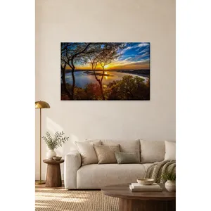 Impresión en lienzo de Fida: Atardecer a través de árboles sobre un lago - Product Image 4