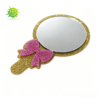 Miroir cosmétique portable à paillettes avec nœud rose et cadre doré, personnalisable avec logo, idéal pour cadeau promotionnel et ornement de bureau