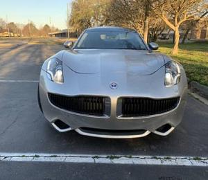 Fisher Kaerma E-Sport AWD 2012, Sedán de Cuero con Doble Batería de Litio, R18, Techo Panorámico, Portaequipajes de Aleación de Aluminio, 6 Plazas - Product Image 1