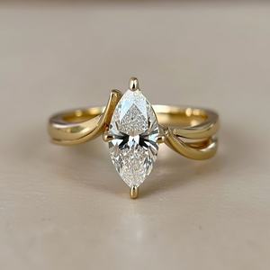 Anillo de Compromiso Clásico con Moissanita Marquise de 1.20 Quilates con Engaste de Puntas en Oro Amarillo Sólido de 14K, Certificado por GRA - Product Image 1