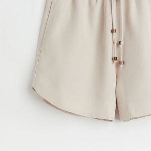 Pantalones de entrenamiento atlético de secado rápido elásticos ligeros con cordón lateral de poliéster gris para mujer con botón de cinturón con logotipo de bolsillo - Product Image 2