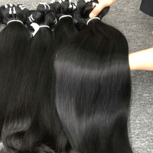Máquina de cabello humano virgen sin procesar vietnamita de tendencia caliente Pelo liso natural negro suave resistente al desprendimiento de trama Doble - Product Image 1