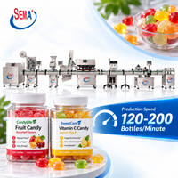 Machine automatique de remplissage, d'emballage, de comptage, de bouchage et d'étiquetage de bonbons gélifiés en bouteille