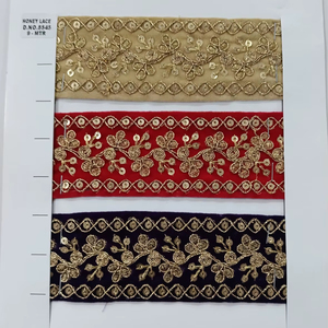 Tela de encaje bordado floral colorida vibrante y detallada con patrones intrincados, perfecta para la moda de alta gama - Product Image 1