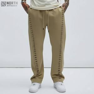 กางเกงวิ่งขายาวสำหรับผู้ชายผ้าคอตตอนขากว้างกางเกงวอร์มทรงหลวมมีรอยขาดสำหรับผู้ชายกางเกงวิ่งสไตล์ลำลองสำหรับฤดูหนาวของ100% - Product Image 1