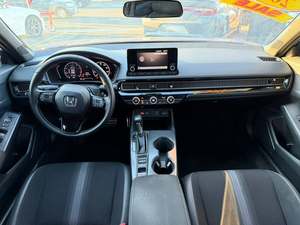 ฮอนด้า ซีวิค สปอร์ต ปี 2024 สีน้ำเงินสวยงาม ขับเคลื่อนล้อหน้า มือสอง พวงมาลัยซ้าย ขนาด R17 พร้อมซันรูฟ สตาร์ทไฟฟ้า เบาะหนังอุ่นได้ เกียร์อัตโนมัติ ล้อแม็ก - Product Image 5