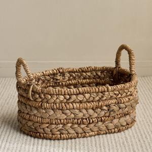 Oval <b>woven</b> water hyacinth <b>basket</b> for home use Handmade Storage <b>Basket</b> Wholesale eco-friendly Made in Vietnam - Product Image 1