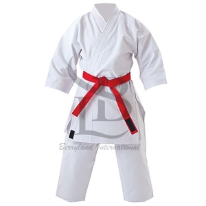 Tela transpirable duradera de ajuste cómodo Taekwondo Gi y diseño clásico para torneos y escuelas de artes marciales personalizadas - Product Image 1