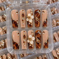 Faux ongles de luxe faits à la main, longs et carrés, à presser, avec nœud en cristal en forme de tuyau et fleurs 3D, vente en gros directe usine