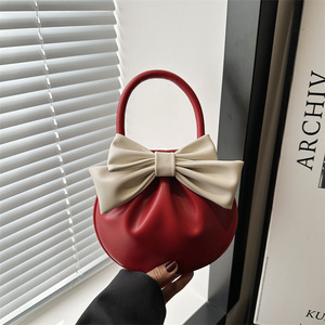 Borsa rotonda alla <span class=keywords><strong>moda</strong></span> per giovani donne nuova borsa a tracolla con fiocco alla <span class=keywords><strong>moda</strong></span> e dolce borsa da <span class=keywords><strong>donna</strong></span> a pieghe alla <span class=keywords><strong>moda</strong></span> - Product Image 1