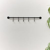 Crochet de manteau décoratif moderne en métal avec la surface brillante et le style minimaliste pour l'usage élégant de bâti de mur