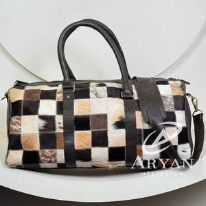 Venta al por mayor al aire libre de pelo de vaca en Patchwork de cuero equipaje bolsa de viaje traje de negocios estilo bolsa de viaje de lona de lujo - Product Image 1