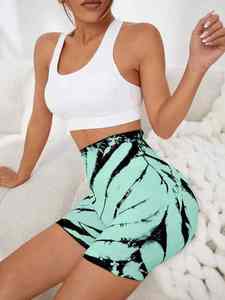 Pantalones cortos de gimnasio de cintura alta para mujer con cierre de cintura elástica Verano Fitness Yoga Entrenamiento Pantalones cortos deportivos en patrón de tinte de corbata sólido - Product Image 4