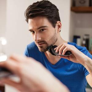 Rasoir électrique double lame humide et sèche, charge sans fil, mini rasoir rotatif pour le visage et le corps, interface en allemand, IPX7 - Product Image 1